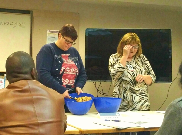 Sherri DeLeonardis and Terri McDaniel make Chex Mix at Four Seasons Toastmasters