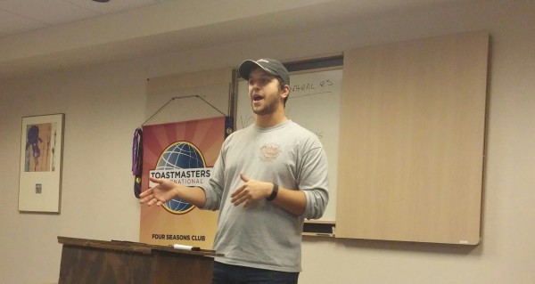 Brandon gives a speech at Four Seasons Toastmasters