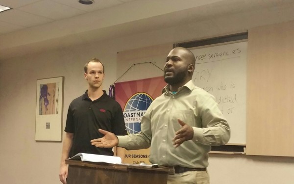 Grant and Termaine doing Table Topics at Four Seasons Toastmasters