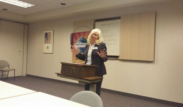 Sally as General Evaluator at Four Seasons Toastmasters Club